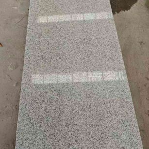 山东芝麻白光面毛板